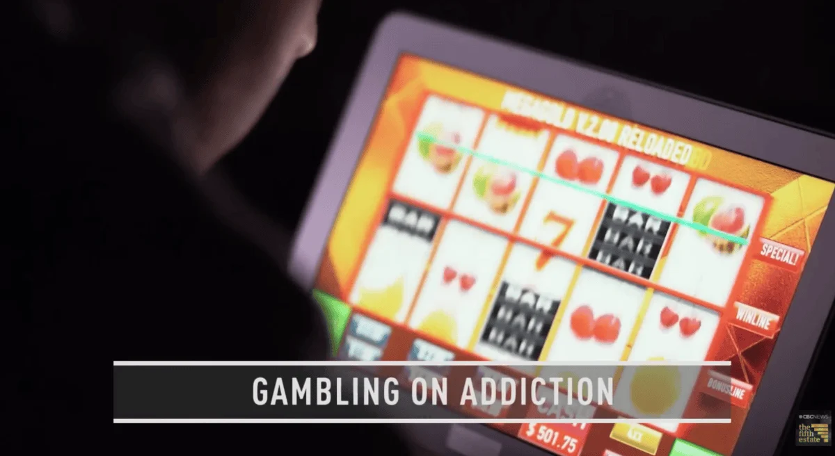 A person plays a digital slot machine game on a tablet in low light. The text overlay reads "Gambling on Addiction," conveying a serious tone.