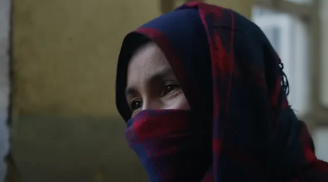 Close up of a mother wearing a niqab.