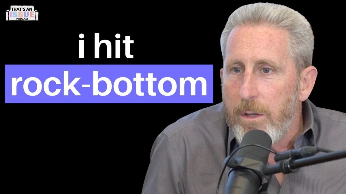 Cut-out of Ike Dweck speaking into a microphone on a black background, with the text "I hit rock-bottom" beside him.