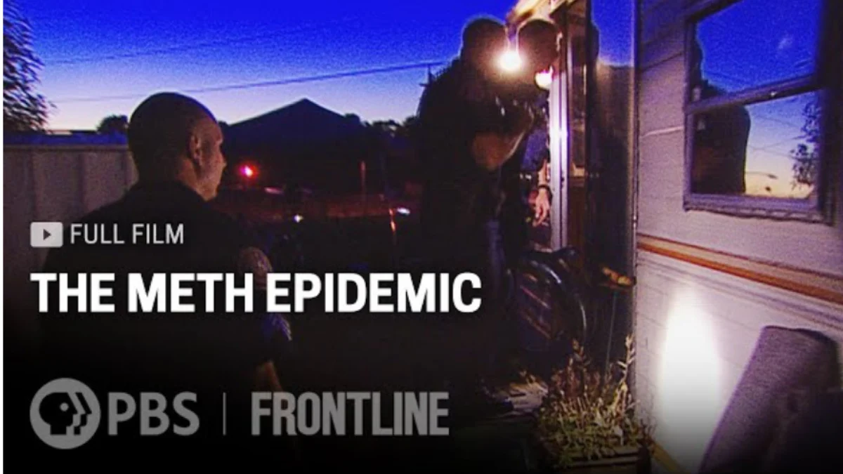 Three police officers at the door of what appears to be a trailer with the text "The Meth Epidemc, PBS Frontline".