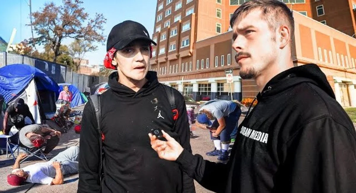 Tommy talking to an individual who lives on Methadone Mile.