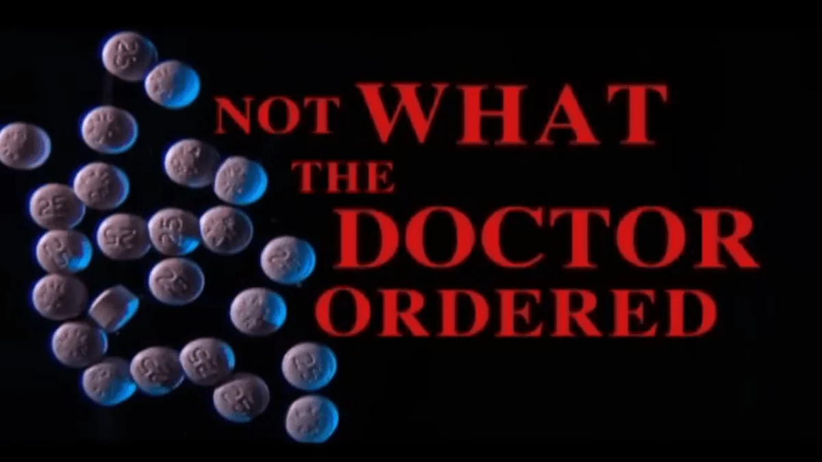 A cluster of blue-tinted pills on a black background with bold red text reading "Not What the Doctor Ordered," conveying a warning or cautionary tone.