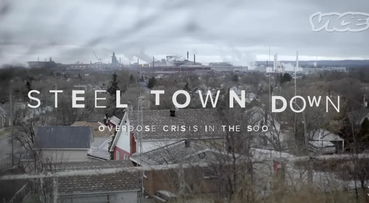 A view of a residential area in Sault Ste. Marie with the title, Steel Town Down: Overdose Crisis in the Soo.
