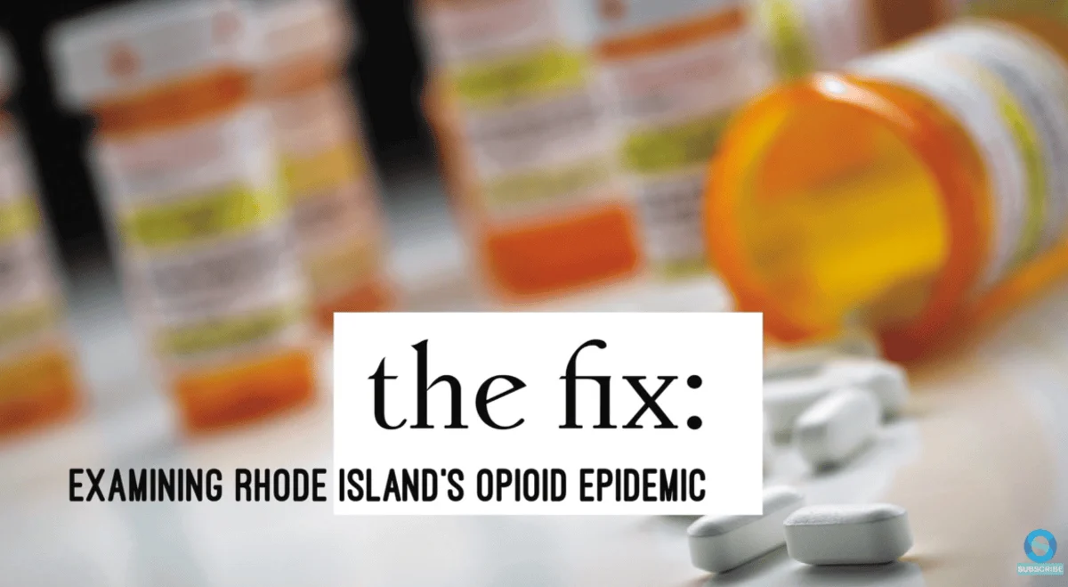 Prescription bottles and spilled pills illustrate Rhode Island's opioid crisis. Text reads "The Fix: Examining Rhode Island's Opioid Epidemic."